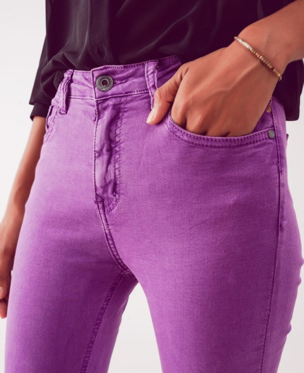 Purple Flare jeans with raw hem edge