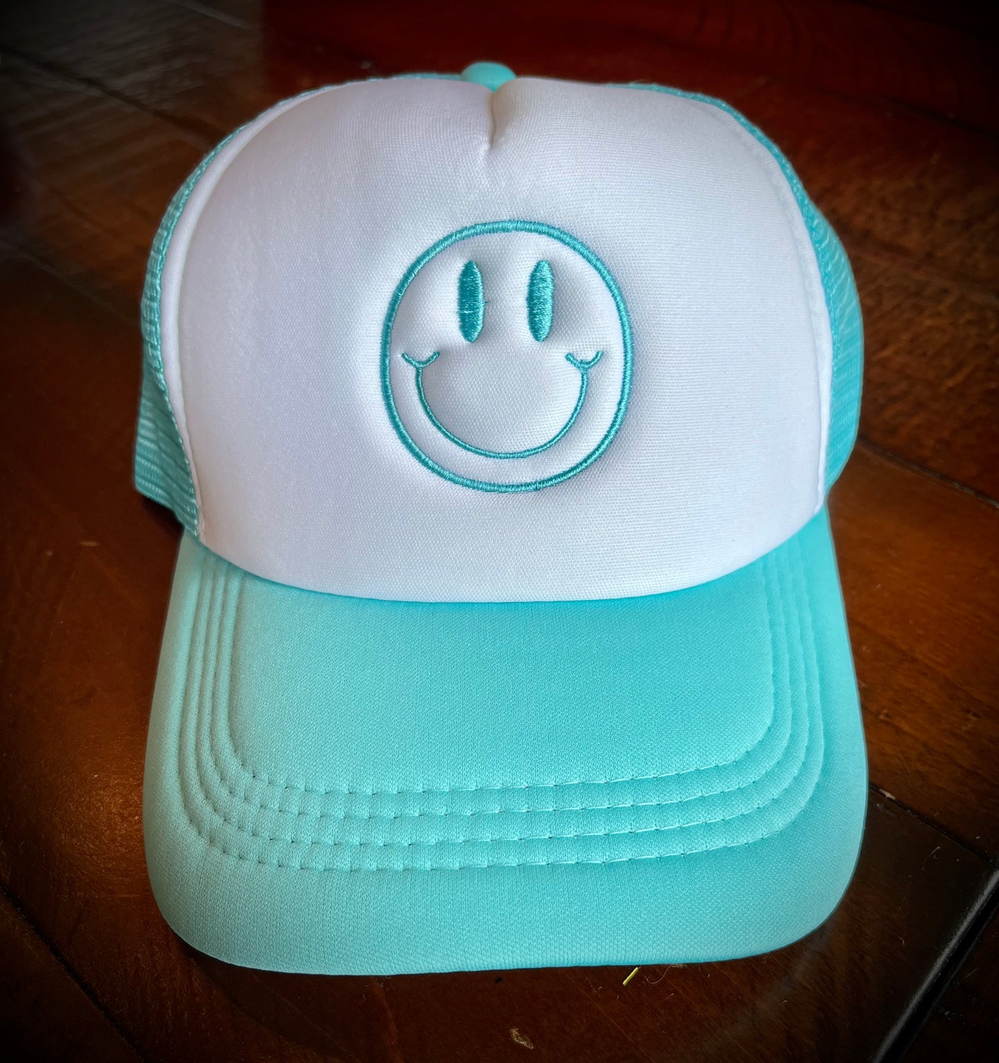 Aqua Smiley Face Trucker Hat